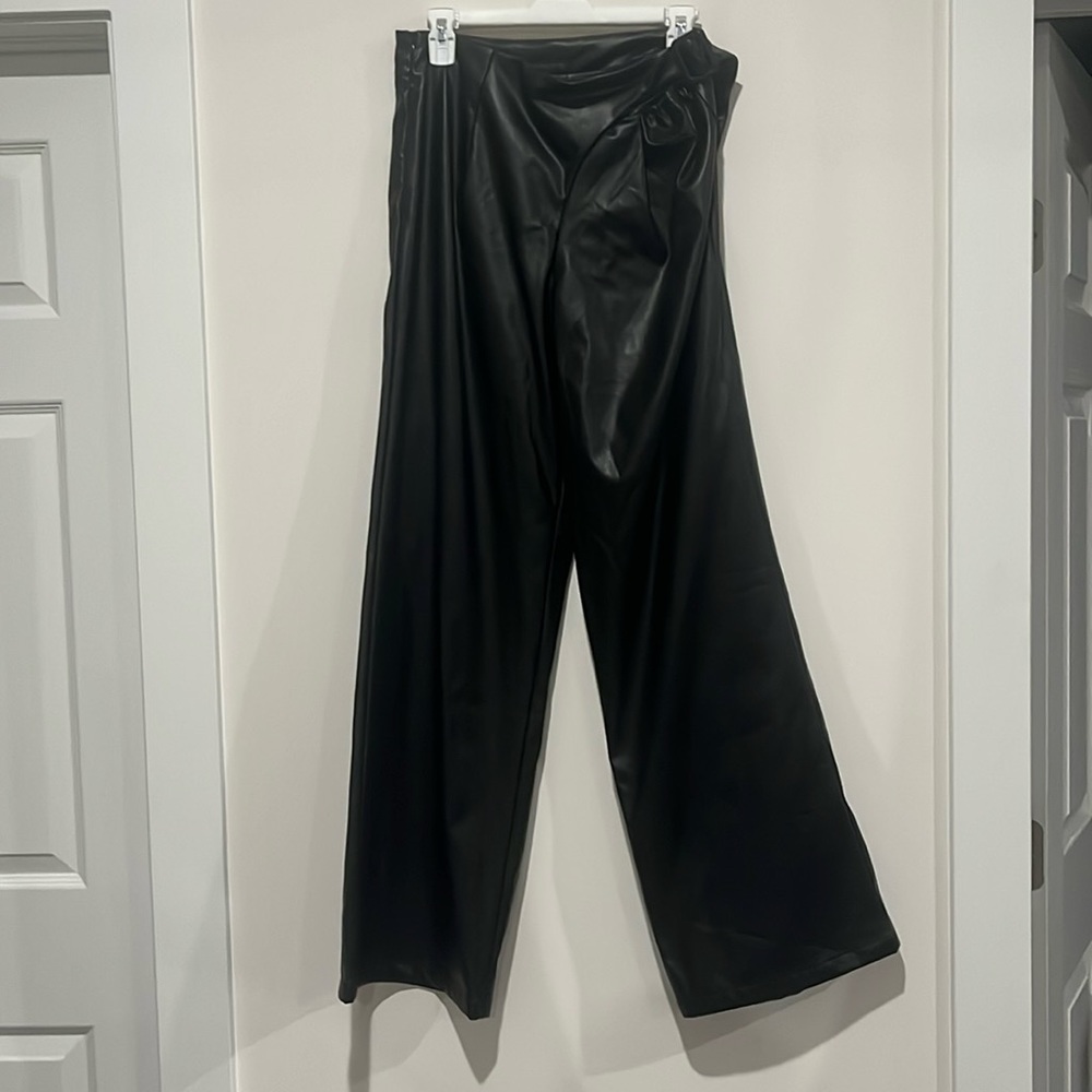 Wide leg hip cut out faux leather pants